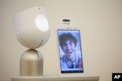 Intuition robotics' 'ElliQ' robot is seen at the company's offices in Ramat Gan, central Israel, on August 23, 2017. (AP Photo/Sebastian Scheiner/File Photo)